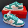 13193488 نایک اس بی دانک لو فیروزهای پوست ماری Nike Dunk Low Snakeskin Washed Teal Bleached Coral