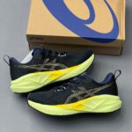 اسیکس نوابلاست 5 سرمه‌ای تیره زرد ASICS Novablast 5 Indigo Blue Amber