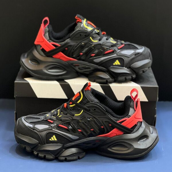 13291630 آدیداس رانر اکس ال جی دیلاکس مشکی قرمز طلایی adidas XLG Runner Deluxe Black Gold Metallic Red
