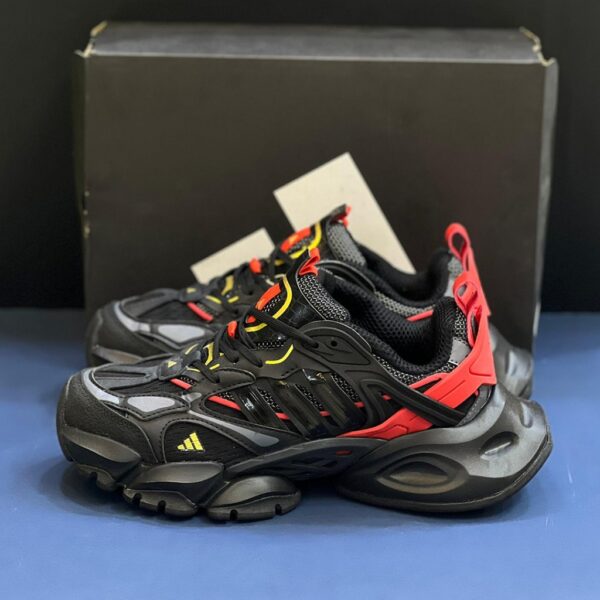 13291631 آدیداس رانر اکس ال جی دیلاکس مشکی قرمز طلایی adidas XLG Runner Deluxe Black Gold Metallic Red