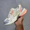 نایک وی تو کی ران کرم متالیک مرجانی Nike V2K Run Coral Metallic Cream