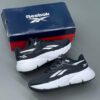 18609826 ریباک زیگنیشن خاکستری مشکی سفید Reebok Zignition Black White