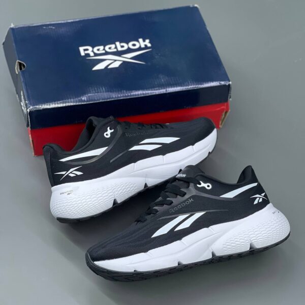 18609826 ریباک زیگنیشن خاکستری مشکی سفید Reebok Zignition Black White